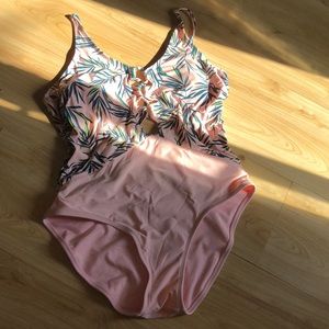Bathing suit color pink with green leaves print